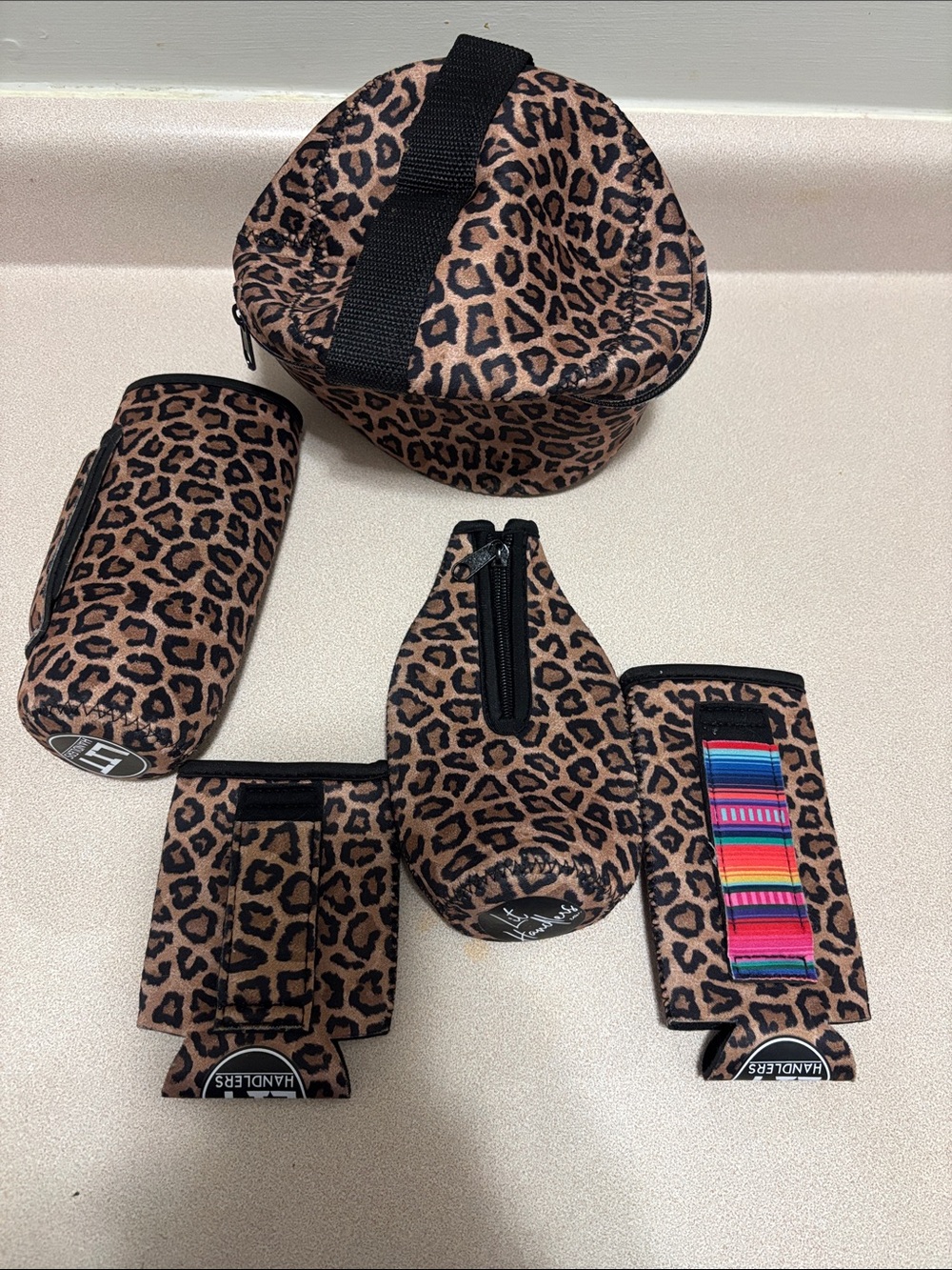 Set of 5 lit handlers coozies